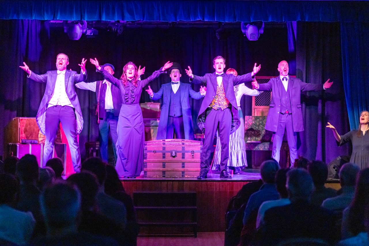 The finale of a song with the whole company on stage