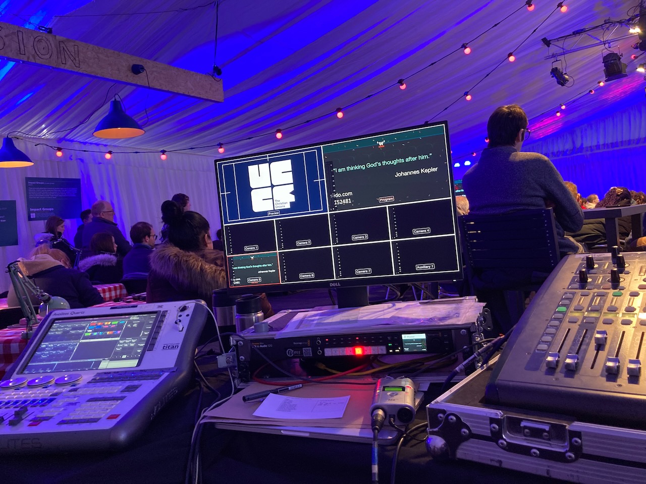 Sound, lighting and video control equipment. UCCF logo shown on the technical screen.
